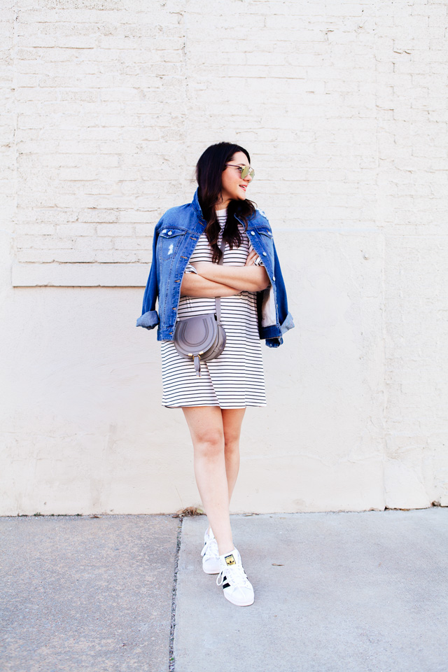 black and white striped dress with denim jacket and adidas superstars