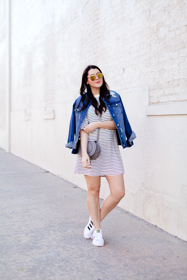 black and white striped dress with denim jacket and adidas superstars