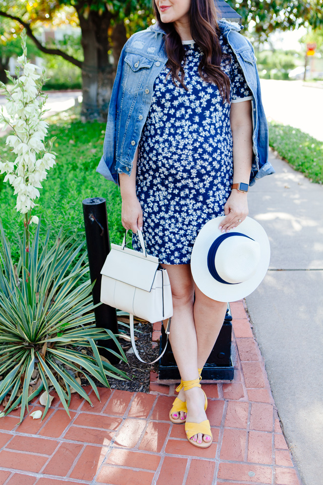 Draper James floral dress with distressed denim jacket.