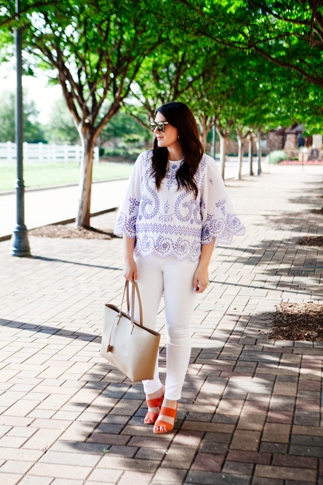 Tory Burch Embroidered Tunic with white jeans. 