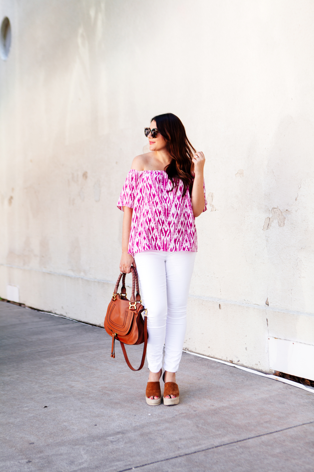 Ikat top with white jeans. Maternity summer style.