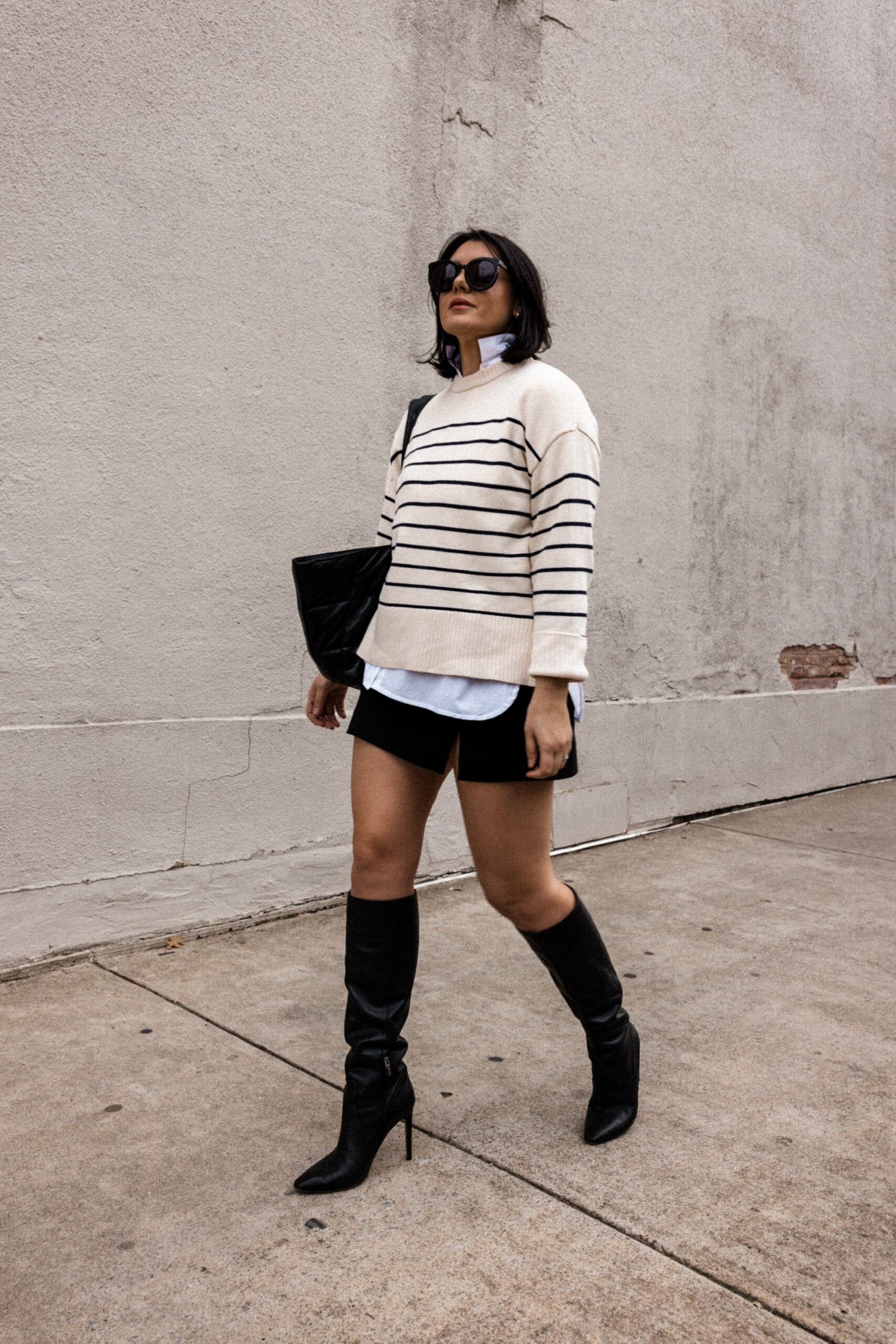 Layered striped sweater black mini skirt outfit for winter 6